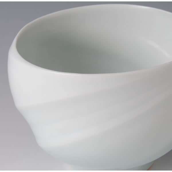 SEIHAKUJI CHORYUMON CHAWAN (White Porcelain Tea Bowl with Sea Current design with Pale Blue glaze) Kyoto ware